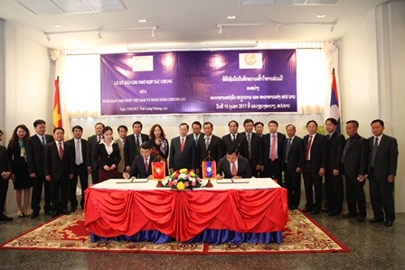  Ngân hàng nhà nước Việt Nam - Lào đẩy mạnh hợp tác song phương - ảnh 1